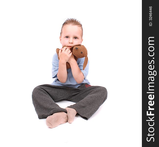 Boy and his toy (dog) on the white background