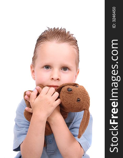 Boy and his toy (dog) on the white background