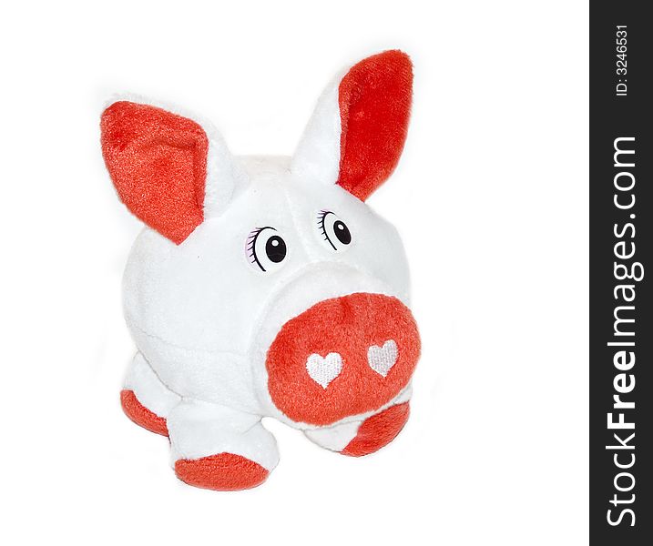 White piggy toy with red ears, feet and nose. White piggy toy with red ears, feet and nose.