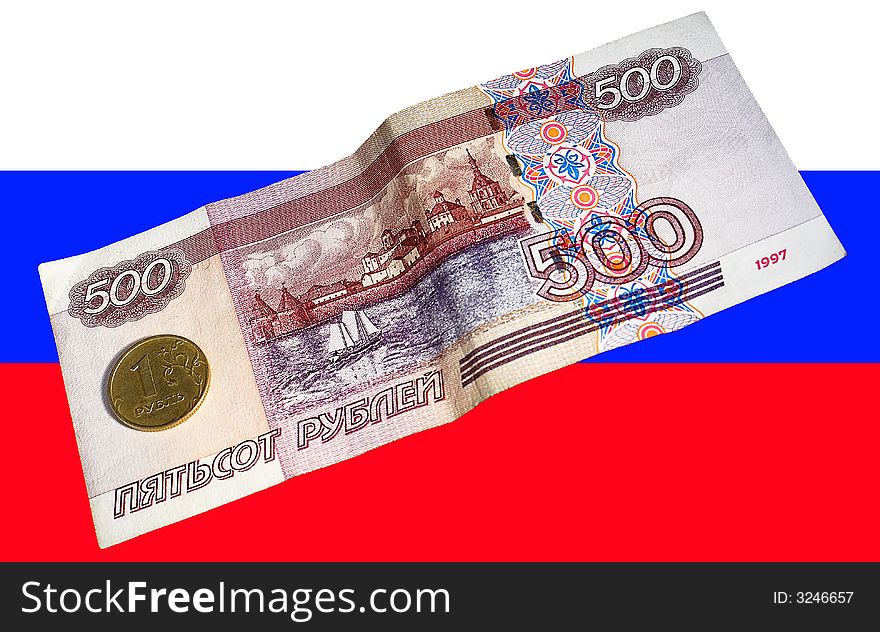 The Russian currency, metal and paper on a background of a national flag. The Russian currency, metal and paper on a background of a national flag.