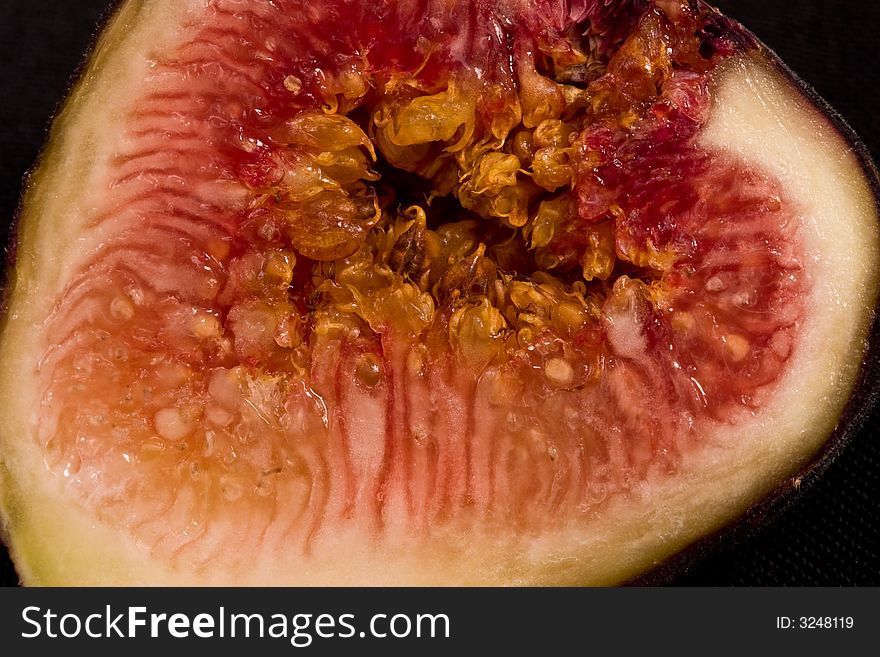 Sliced fig fruit macro closeup. Sliced fig fruit macro closeup