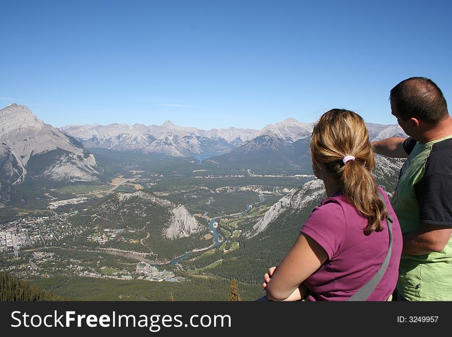 Couple overlooking rockies mou