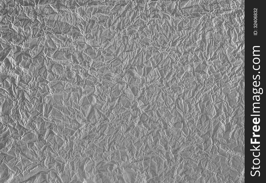 Background from sheet of a crushed grey paper. Background from sheet of a crushed grey paper