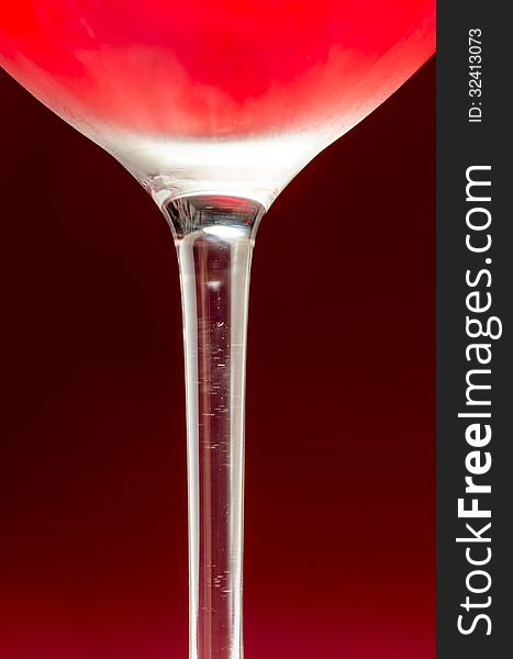 Wineglass with cold red wine