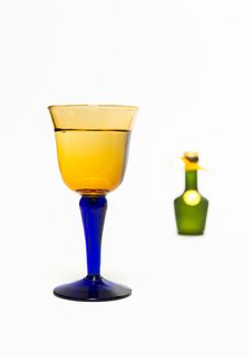 Zoom In Whisky Glass With Blur Green Whisky Bottle Royalty Free Stock Image