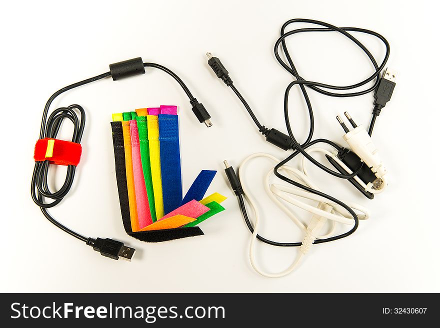 Colorful marker straps with wire and cables isolated on white background