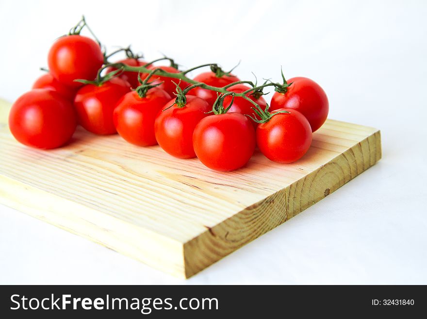 Cherry tomatoes isolated on white