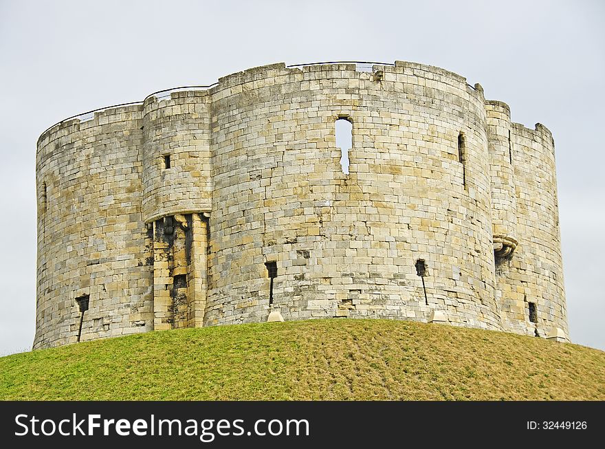 The historic castle called 'Clifford Tower' in York, England. The historic castle called 'Clifford Tower' in York, England.