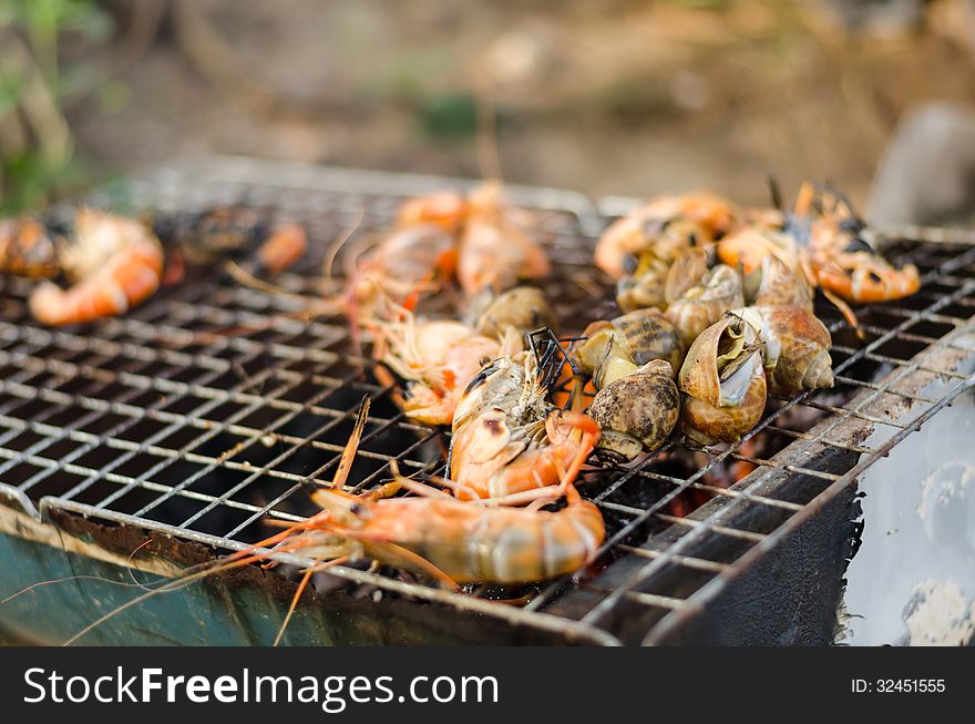 Shrimp and shell grill on the beach. Shrimp and shell grill on the beach