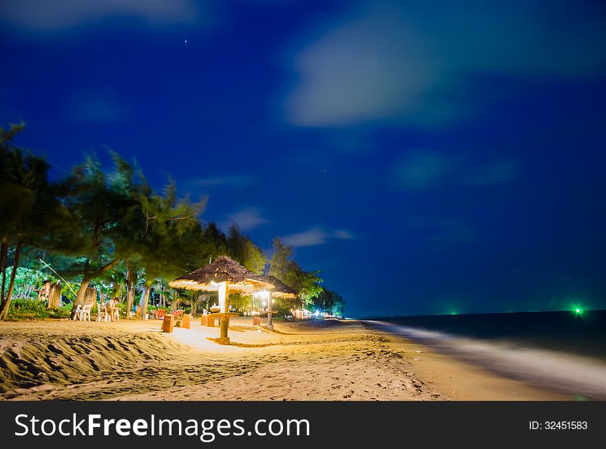 The night beach with deep blue sky