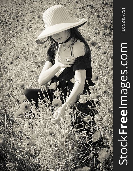 Portrait of summer gothic girl on field