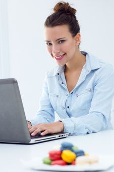 Woman With Laptop Working At Home Stock Photography