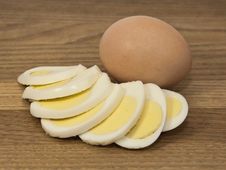 Brown Egg And Egg Slices Royalty Free Stock Images Brown Egg And Egg Slices Royalty Free Stock Images
