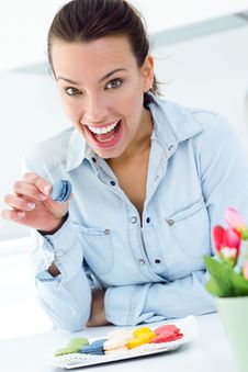 Woman Eating French Cookies At Home Stock Photos Woman Eating French Cookies At Home Stock Photos