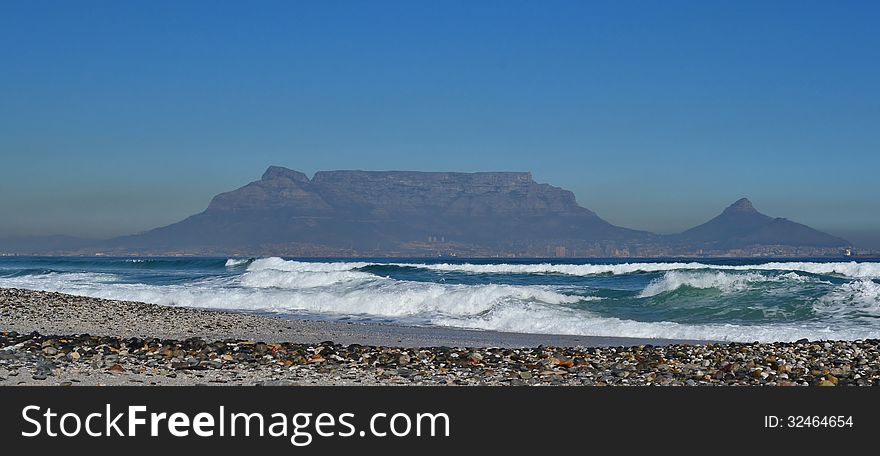 Landscape with sand dunes and Table Mountain