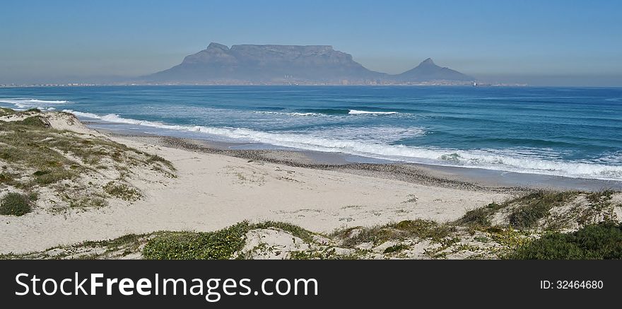 Landscape with sand dunes and Table Mountain