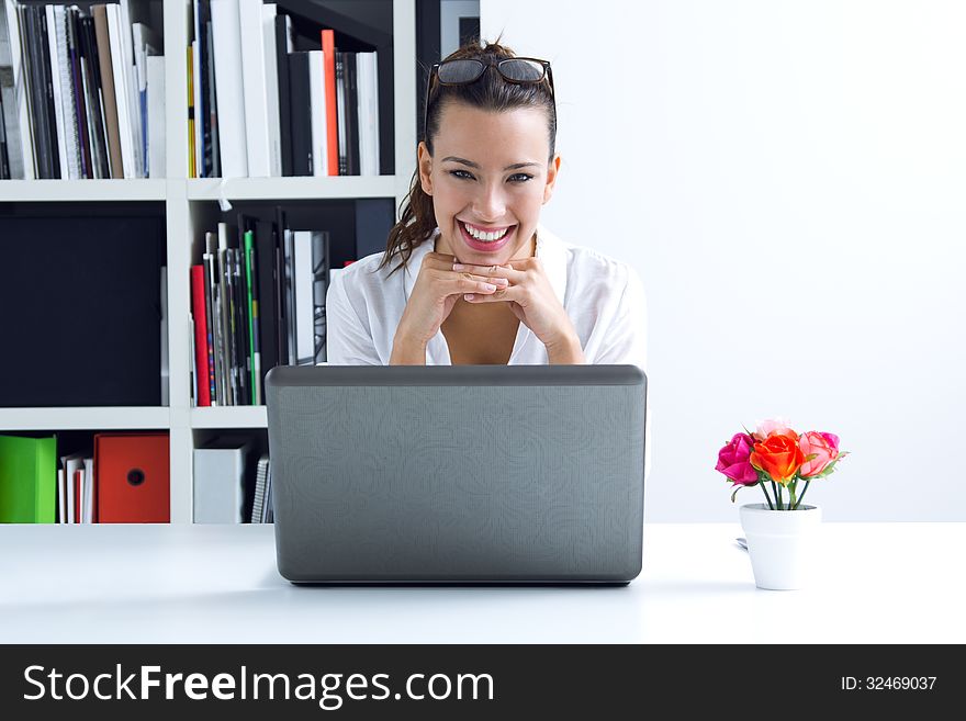 Woman With Laptop Working At Home