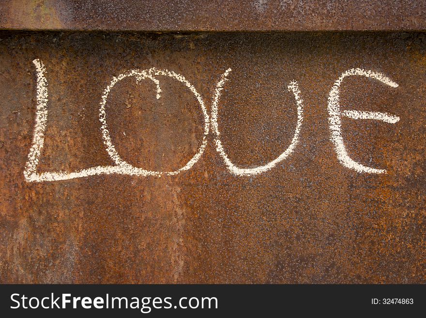 Love written on a rusty surface. Love written on a rusty surface