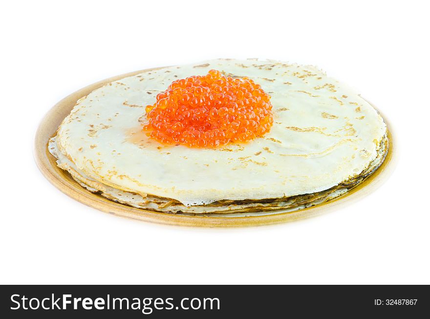 The isolated plate with pancakes and caviar on a white background