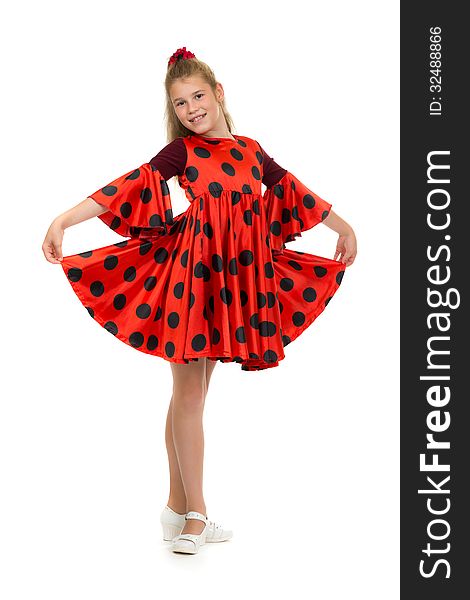 Teen girl in a red dress with polka dots. Isolate on white.