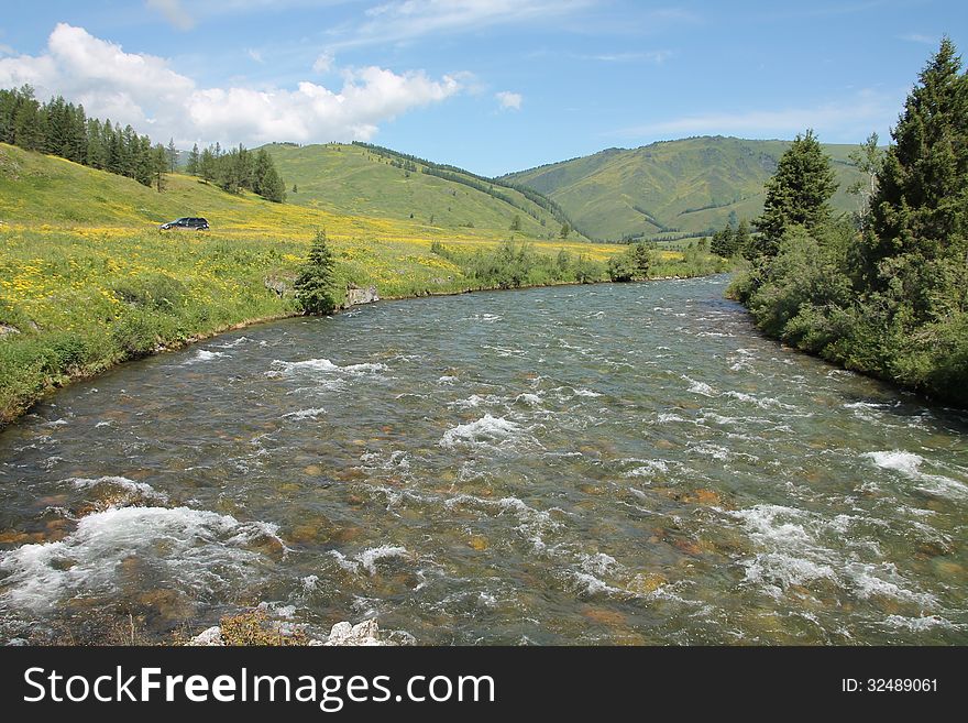 Wild mmountain river in beautiful natural landscape in Altai East Kazakhstan. Wild mmountain river in beautiful natural landscape in Altai East Kazakhstan
