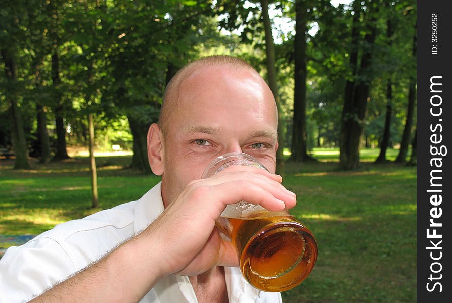 Snapshot of man with beer. Snapshot of man with beer