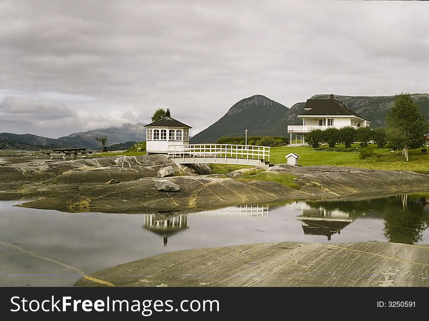 Beautiful wooden bower in garden - Norway. Beautiful wooden bower in garden - Norway.