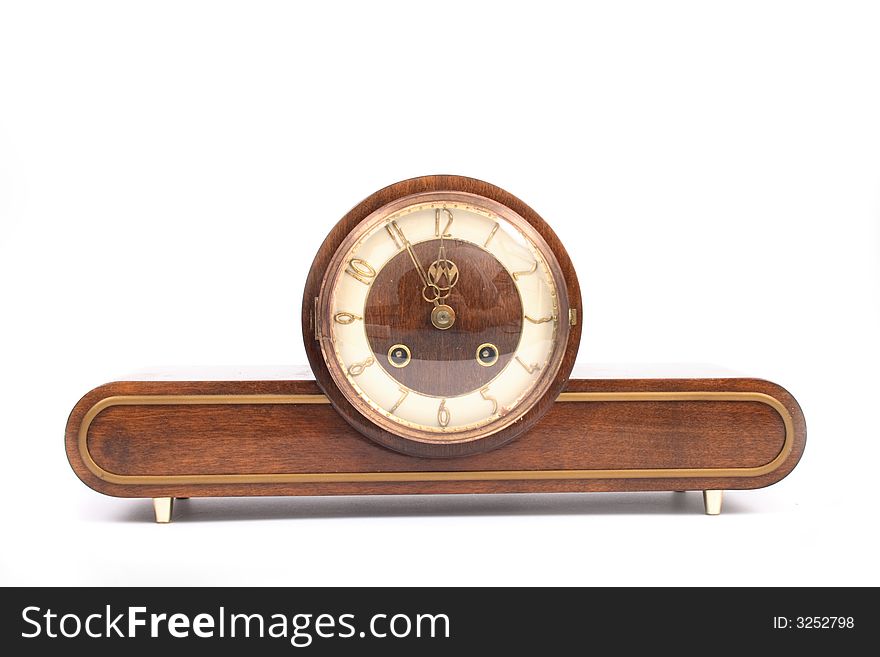 Old wooden clock on the white background. Old wooden clock on the white background