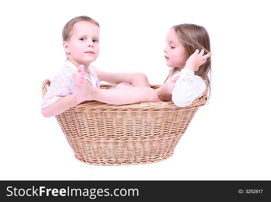 Twins in the basket on the white background