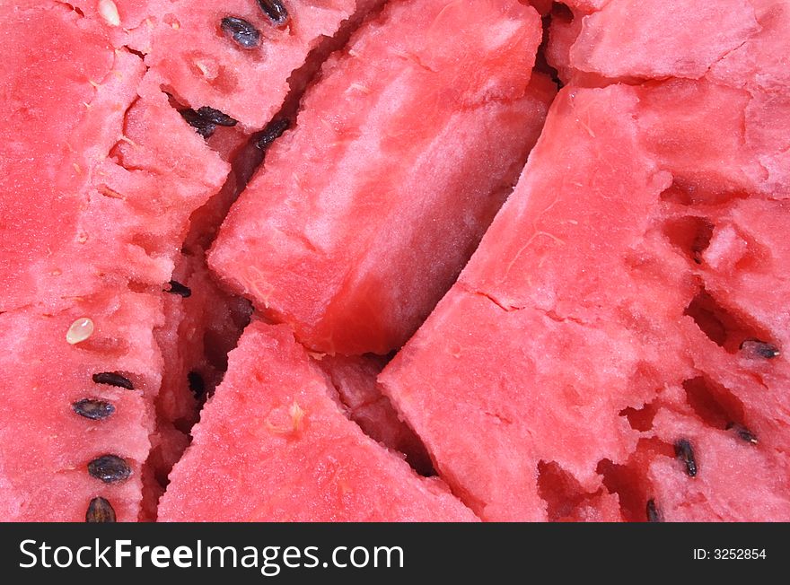 Fresh red watermelon texture with seeds (macro ). Fresh red watermelon texture with seeds (macro )