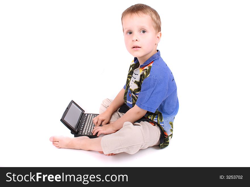 Young manager (boy) and his portable computer on the white background. Young manager (boy) and his portable computer on the white background