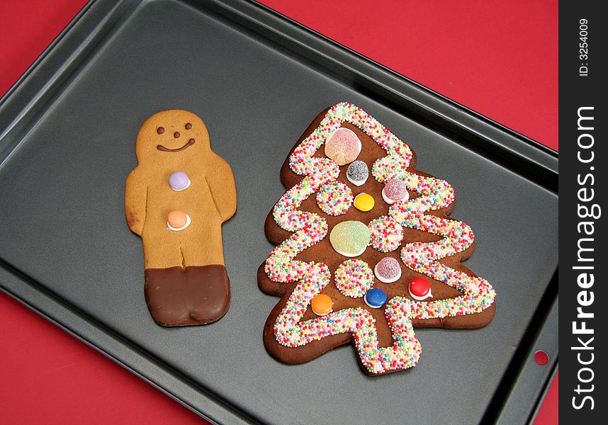 Beautifully decorated gingerbreadman and tree. Beautifully decorated gingerbreadman and tree