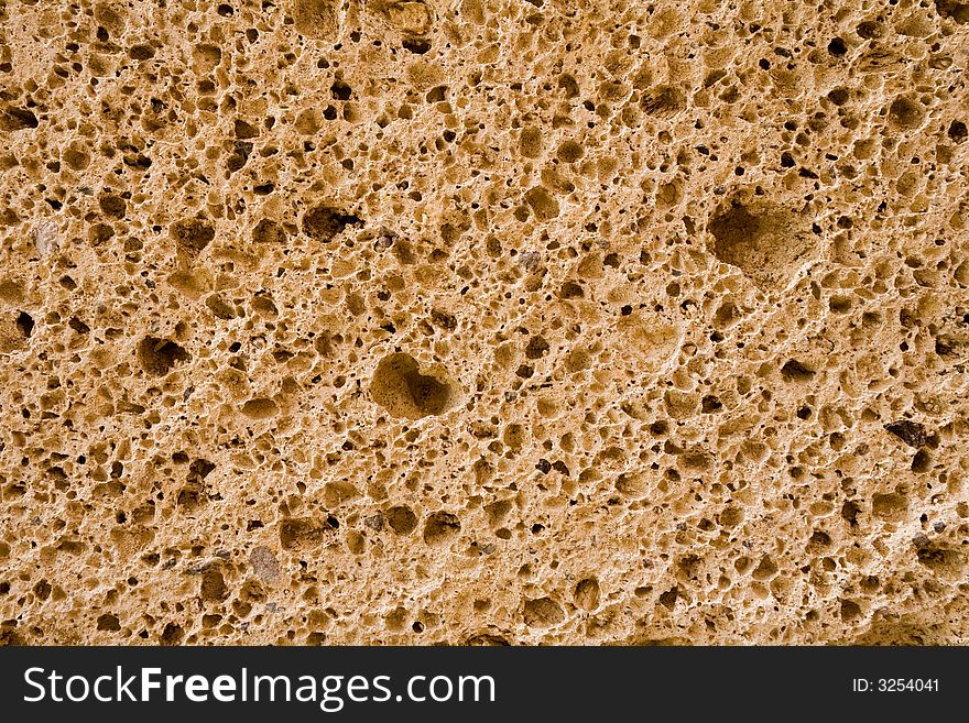 Cream stone background on a street wall