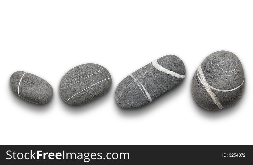 Four grey stones isolated ovwr white with shadow. Four grey stones isolated ovwr white with shadow