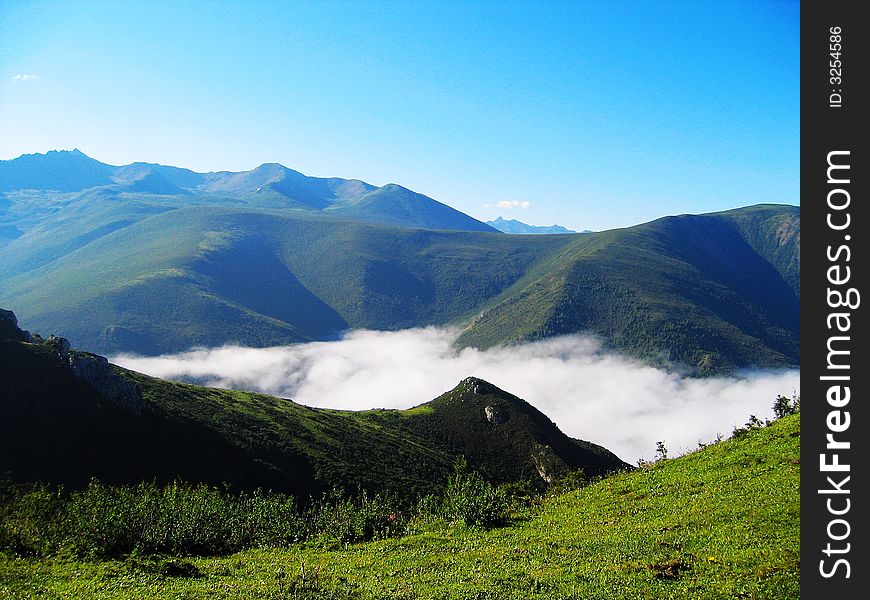 Cloud in the mountains of west china. Cloud in the mountains of west china