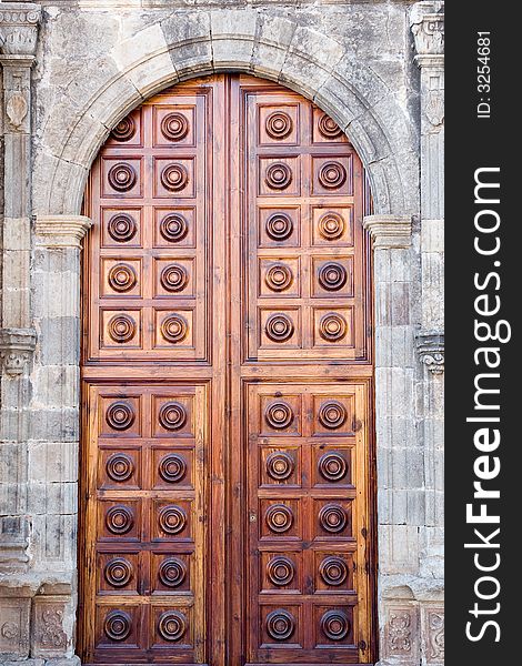 door of a cathedral done with wood. door of a cathedral done with wood