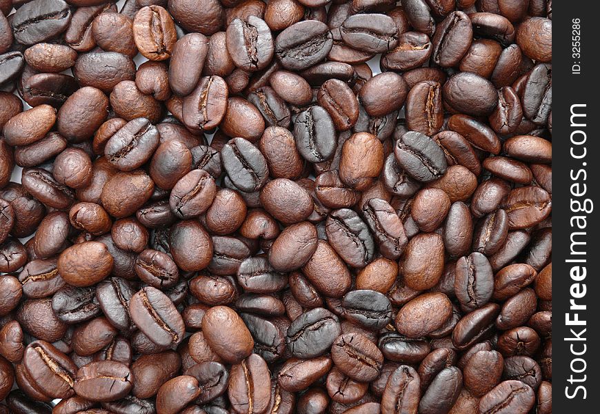 Background image of delicious freshly roasted coffee beans