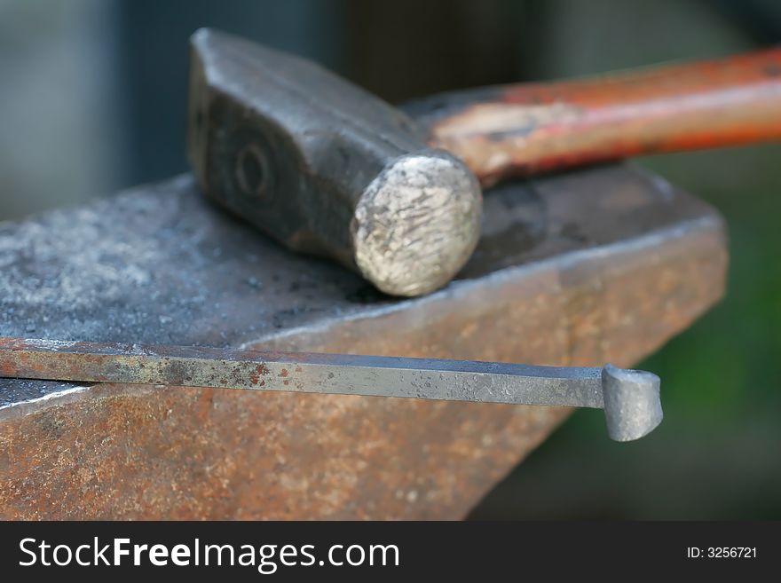 Blacksmith s Hammer and Iron