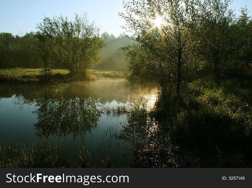 Wilderness area Meanders of Lucina river in Havirov in Czech republic - sunrise upon marshes