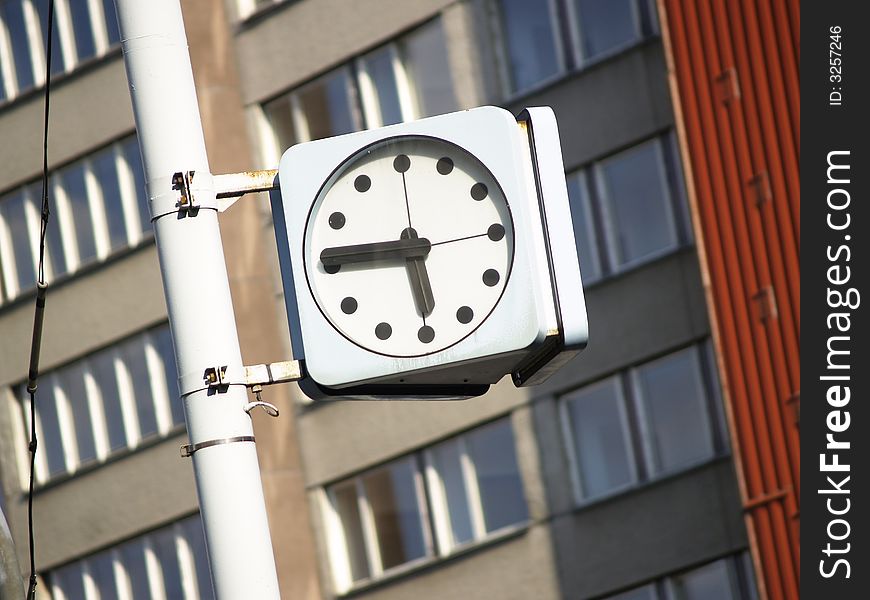 Vivid and colourful view of a city clock time is five fourty five