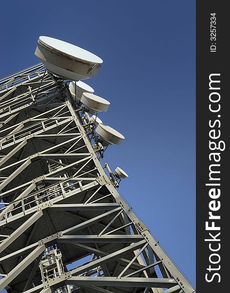 Communications iron tower from below. Communications iron tower from below