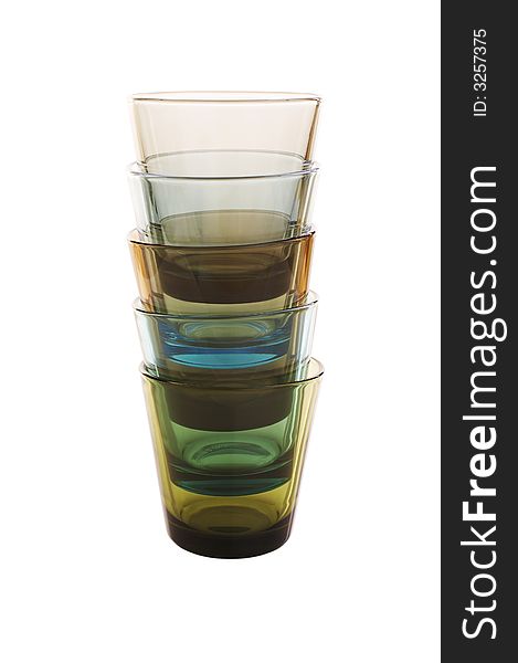 Isolate pile of colored water glasses over a white background