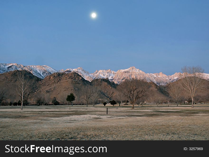 The full moon above Mt Whitney at dawn. The full moon above Mt Whitney at dawn