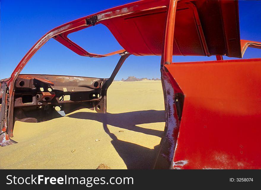 Wrack of a car in the desert of Algeria. Wrack of a car in the desert of Algeria