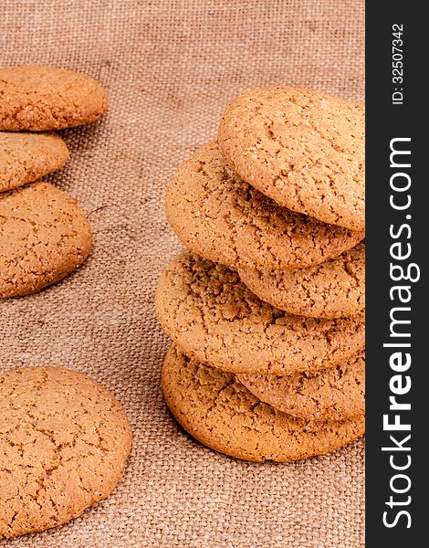 Stacked Brown Cookies On Rustic Background