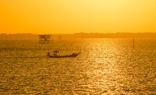 Fisherman Boat With Golden Sunrise On The Sea Stock Photos Fisherman Boat With Golden Sunrise On The Sea Stock Photos