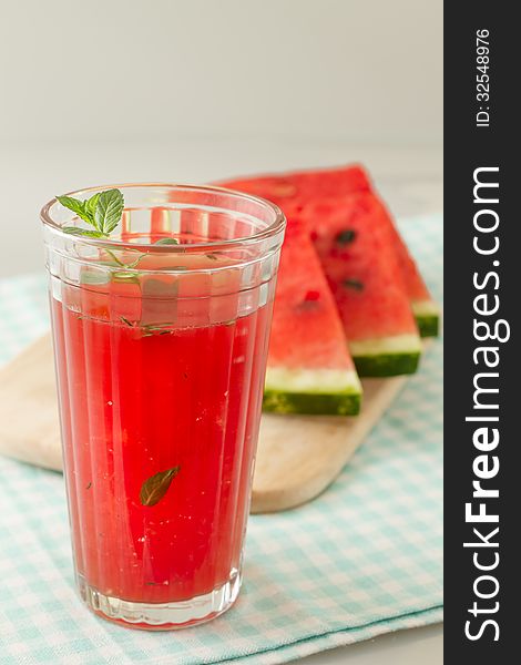 Glass of watermelon juice and fresh fruit