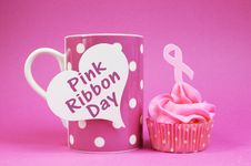 Pink Ribbon Cupcake With Message On Coffee Cup Stock Photos Pink Ribbon Cupcake With Message On Coffee Cup Stock Photos