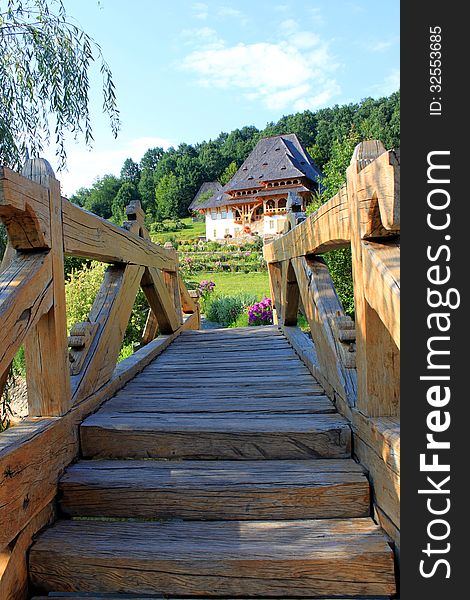 Wooden bridge in Barsana monastery, Romania.