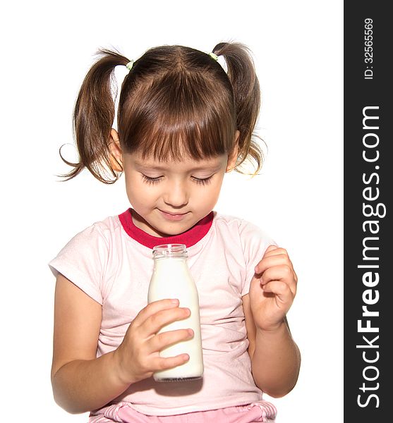 Cute lttle girl with bottle of milk isolated on white. Cute lttle girl with bottle of milk isolated on white
